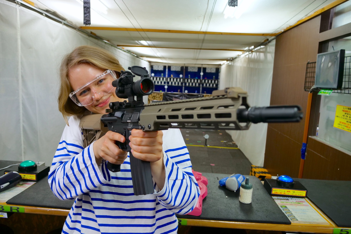 Practicing your aim at an airsoft gun shooting range in Akihabara